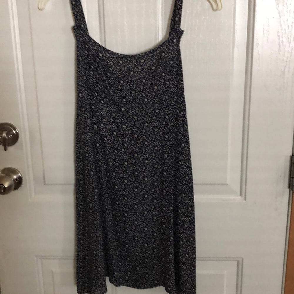 Dark blue summer dress with flower pattern.